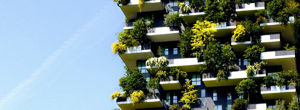 Decorative element: Building with greenery on the facade